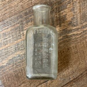 Clear Glass Bottle - Embossed 'French Gloss' 3 Fl. Oz. Whittenmore Boston